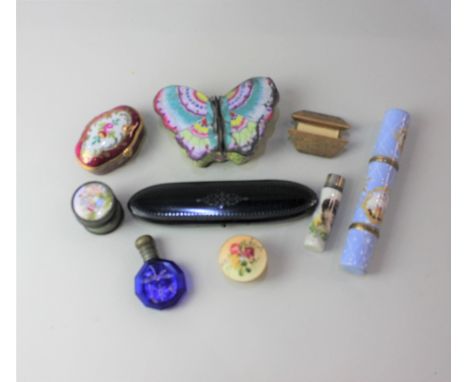 An enamel double ended perfume bottle case and screw off vinaigrette, possibly French, decorated with vignettes of pastoral s