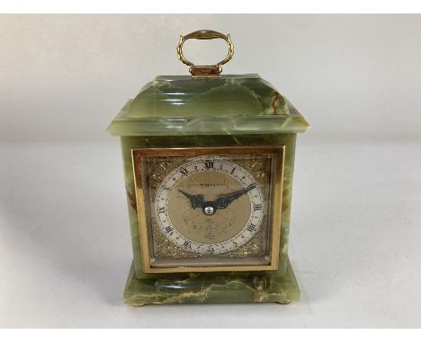An onyx cased Elliott mantle clock, the square gilt dial with cherub spandrels engraved G H Pressley &amp; Sons Worthing, (a/