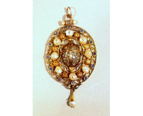 YELLOW METAL OVAL SHAPED PENDANT WITH DIAMONDS (APPROX ½ CARAT), SAPPHIRES, EMERALDS, RUBIES AND PEARLS, ARROW AND BEETLE/SCA