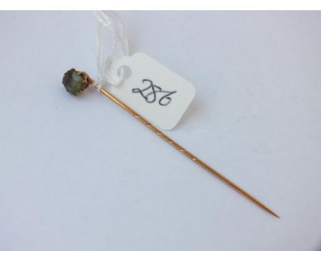 Gold &amp; peridot stick pin      