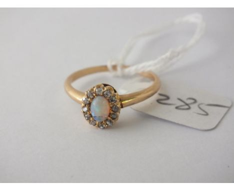 14ct. oval and diamond dress ring, size R 2.8g.   