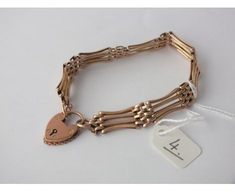 A 9ct. four bar gate bracelet with heart locket 1 bar   missing, 14.8g.       