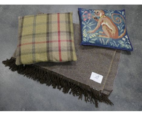 Fringed woollen throw, tartan cushion and tapestry monkey cushion  