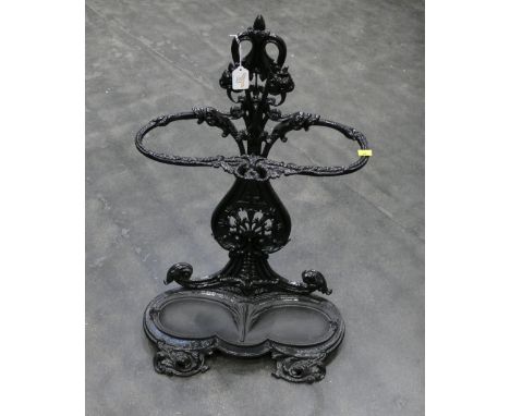 Black painted ornate cast metal stick stand 