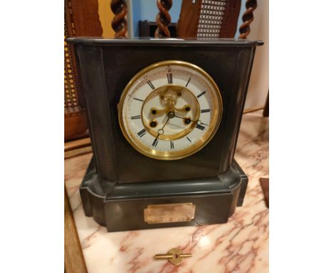 Victorian slate mantle clock with french brass  mechanism with key and pendulum and presentation plaque . 