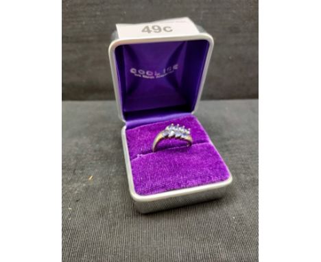 Beautiful Silver ring set with in purple stones . 