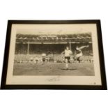 Geoff Hurst signed 25x18 framed photo of Geoff Hurst scoring the winning goal in the 1966 World