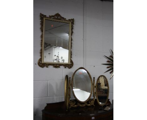 A WALL MIRROR, with ornate gilt and painted frame, a gilt framed triple mirror and a firescreen (3)