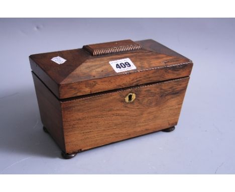 A SARCOPHAGUS SHAPED TEA CADDY