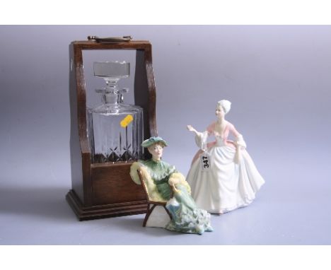A SINGLE GLASS BOTTLED TANTALUS, and two Royal Doulton figures, 'Ascot' HN2356 and 'Diana' HN3266 (3)