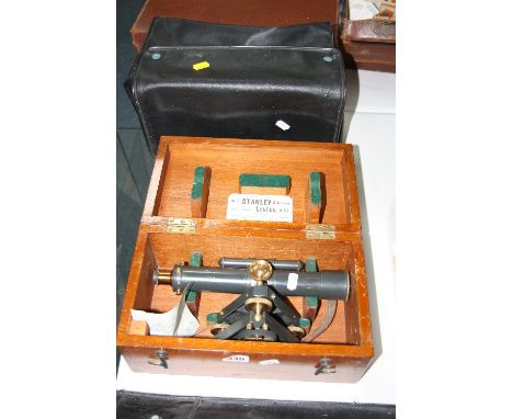 A BOXED W.F. STANLEY & CO SURVEYOR'S LEVEL, with carry case and a cased tripod