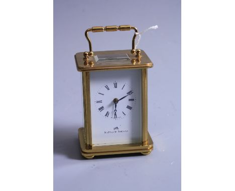 A MATTHEW NORMAN, LONDON BRASS CARRIAGE CLOCK, original case, 11cm, instructions, key