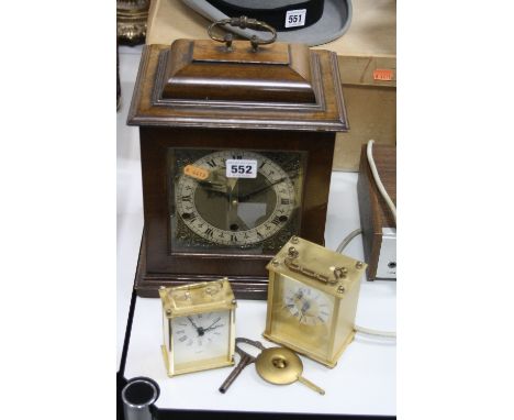 TWO QUARTZ CARRIAGE CLOCKS, together with a mantel clock (key and pendulum) (3)