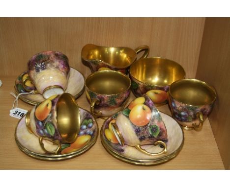 LEIGHTON MAYBURY FRUIT PAINTED TEAWARES, comprising five cups, six saucers, milk jug and sugar bowl, all signed Leighton and 