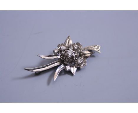 A MODERN DIAMOND SPRAY BROOCH, floral and foliate design, measuring approximately 55 x 24mm, pin and roller catch fitting, pr