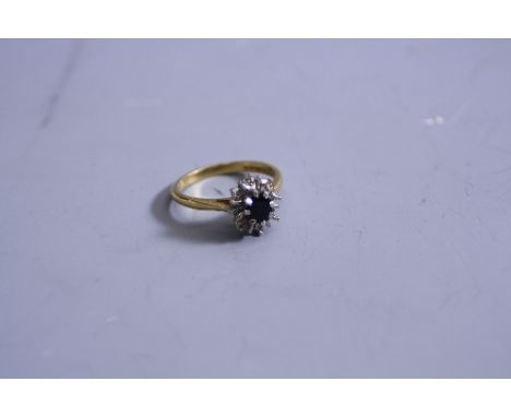 AN 18CT SAPPHIRE AND DIAMOND RING, ring size K