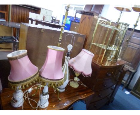 A BRASS STANDARD LAMP, brass bedside unit, brass umbrella stand and five various table lamps (three with shades) (8)