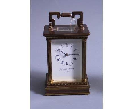 A MATTHEW NORMAN, LONDON, BRASS CARRIAGE CLOCK, original case, 12cm, instructions, key (sd)
