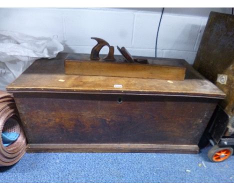 A VICTORIAN ELM BLANKET CHEST, containing a quantity of miscellaneous and a vintage wood plane