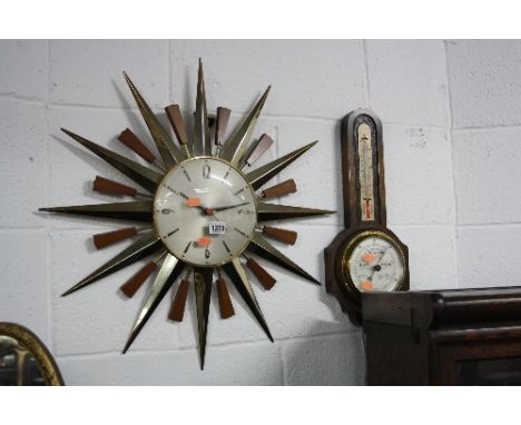 A MODERN METAMEC SUNBURST WALL CLOCK, (battery movement), barometer and three wall mirrors (5)