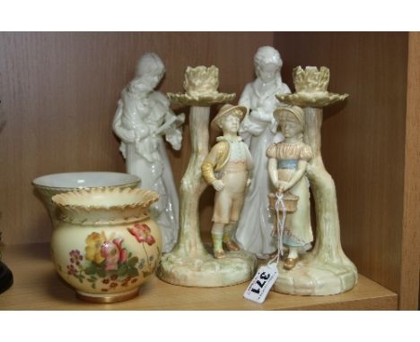 A GROUP OF ROYAL WORCESTER, to include a pair of figural candlesticks (both with restorations), blush ivory vase No.1651, 'Sw