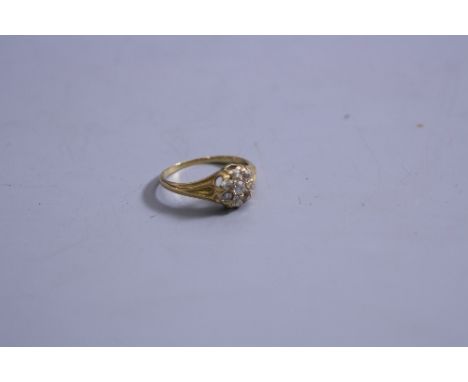 AN 18CT DIAMOND CLUSTER RING, ring size K