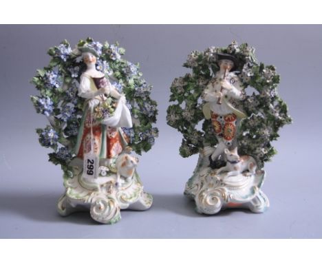 TWO 18TH CENTURY DERBY FIGURE GROUPS, William Duesbury & Co, c.1760, shepherd playing pipe and shepherdess, both on scrolling