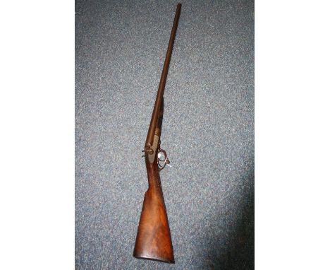 A 12 BORE 2 1/2' CHAMBERED BLACK POWDER PROVED SIDE BY SIDE HAMMER SHOTGUN, bearing the name Frederick T. Baker, 88 Fleet Str