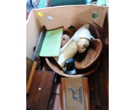 A box of decorative dagger, African warrior leather panels, and other wood items 