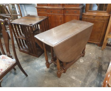 An oak drop leaf and gate leg table 
