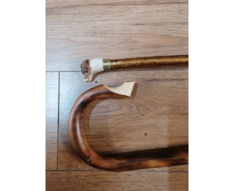 Shepherd's crook with turned shaft and a walking stick with dog head finial 