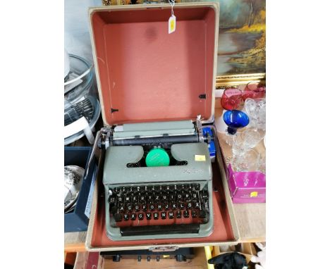 Vintage Olympia typewriter in case