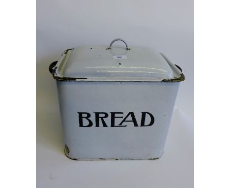 A vintage enamel bread bin and cover 