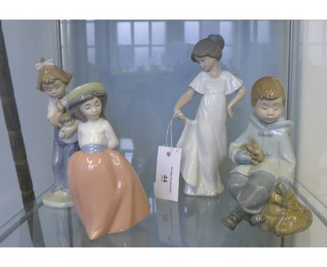 Four Nao Spanish porcelain boy and girl figures (4) tallest 22cm high