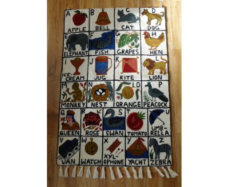 An alphabet wall hanging tapestry panel 