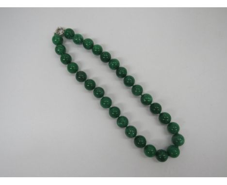 A hand knotted Jade necklace, 14mm beads 