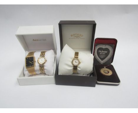 A collection of Accurist and Rotary wristwatches together with a silver Birmingham Mint valentine commemorative coin necklace