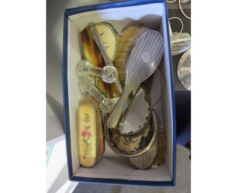 Assorted dressing table items including two silver backed mirrors and silver comb together with two cut glass knife rests 