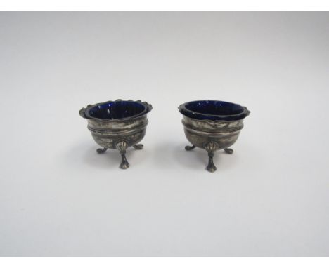 A pair of silver footed table salts with Bristol blue glass liners 