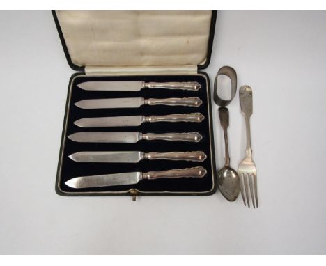 A cased set of six silver handled knives and associated silver fork, teaspoon and napkin ring 