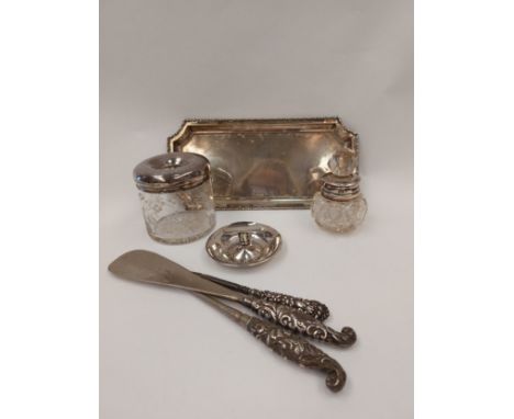 A collection of silver items; rectangular card tray, dressing table pots, etc 