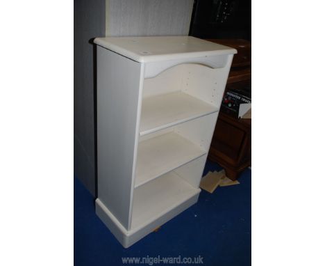 A modern white finish three shelf bookcase 22" x 36" x 11"