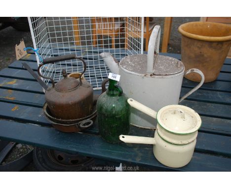 A copper kettle, pans, enamel saucepans, a large white enamelled 19th century design watering can, etc.,