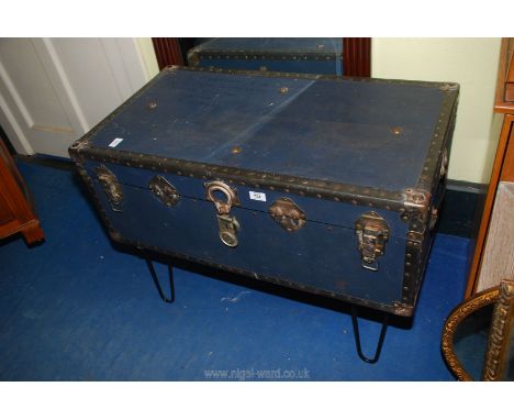 A travel trunk recycled to a lounge table 