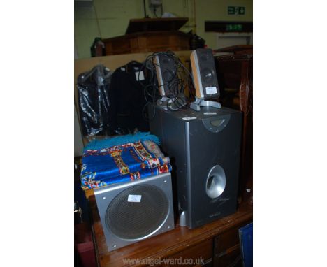 A sub woofer speaker and a prayer mat