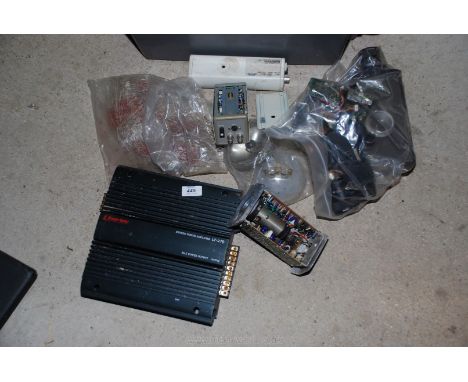 Box of various back up power supply, power amplifier, radio spares etc.