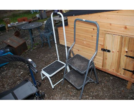 A two step metal step ladder and a handy stepper.
