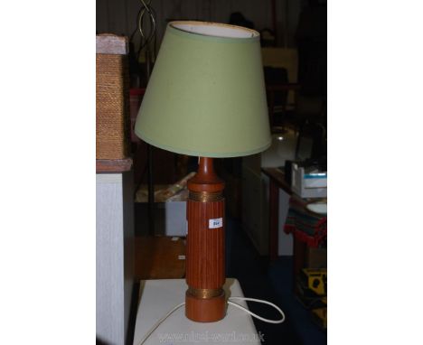 A wooden table lamp.