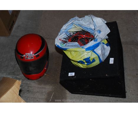 A motor cycle helmet, a speaker base and nail gun strips.