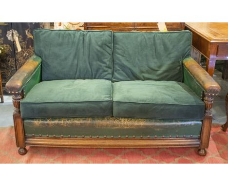 SOFA, circa 1920, oak in old green/brown leather with newly upholstered velvet seat and back cushions, 78cm H x 141cm x 90cm.